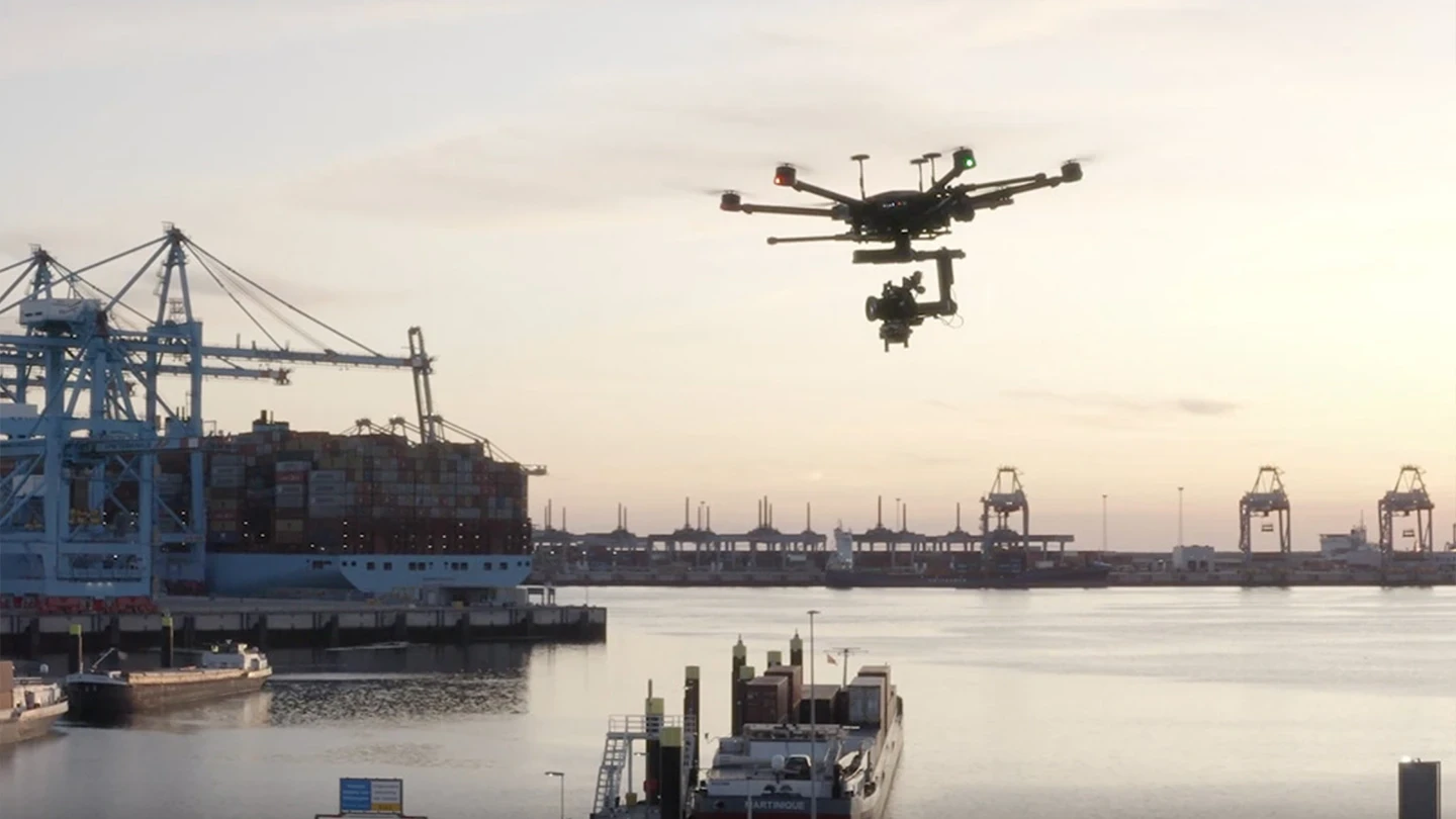 A drone above the port at dusk