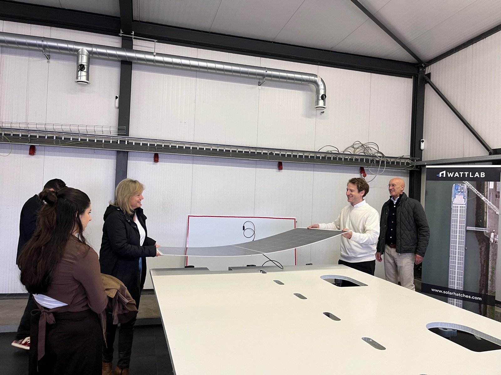 WattLab demonstrating their flexible solar panel at SubZero